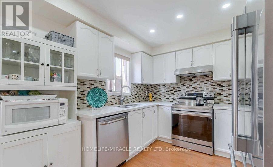 Upper - 60 Studebaker Trail, Brampton, ON - Indoor Photo Showing Kitchen With Double Sink