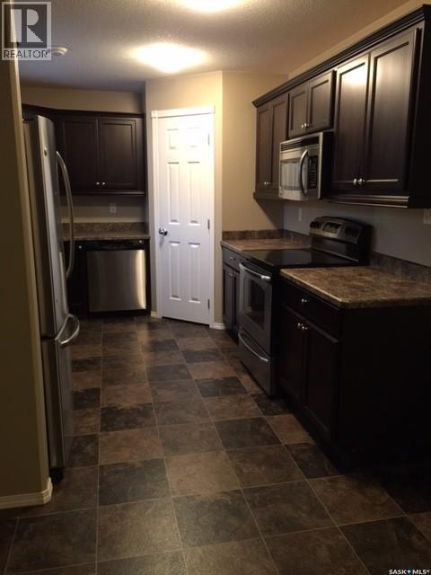 1610 5Th Avenue N, Regina, SK - Indoor Photo Showing Kitchen With Stainless Steel Kitchen