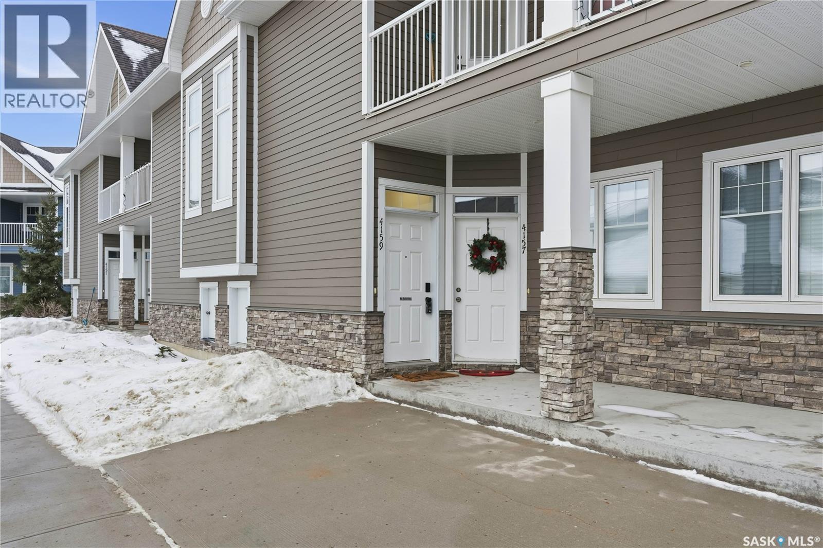4159 Green Apple Drive E, Regina, SK - Outdoor With Balcony With Facade