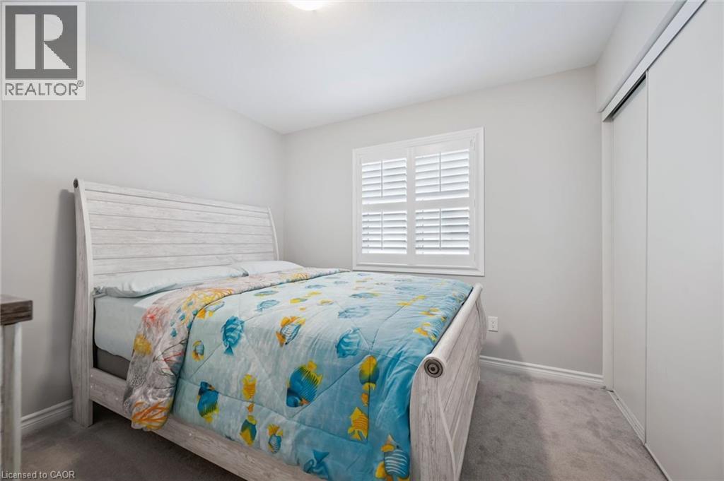 Bedroom featuring carpet floors and a closet - 38 Park Glen Street, Kitchener, ON - Indoor Photo Showing Bedroom