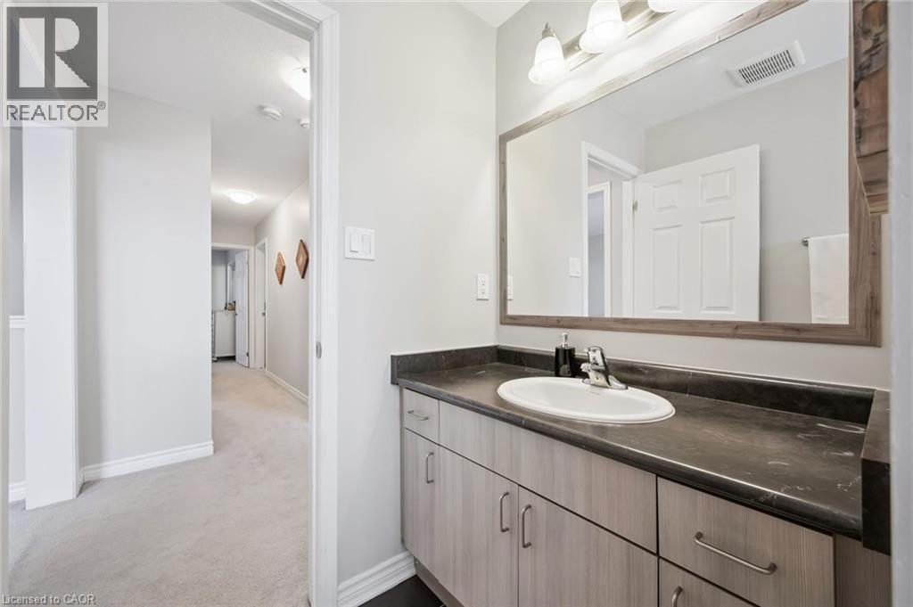 Bathroom with vanity and dark carpet - 38 Park Glen Street, Kitchener, ON - Indoor Photo Showing Bathroom