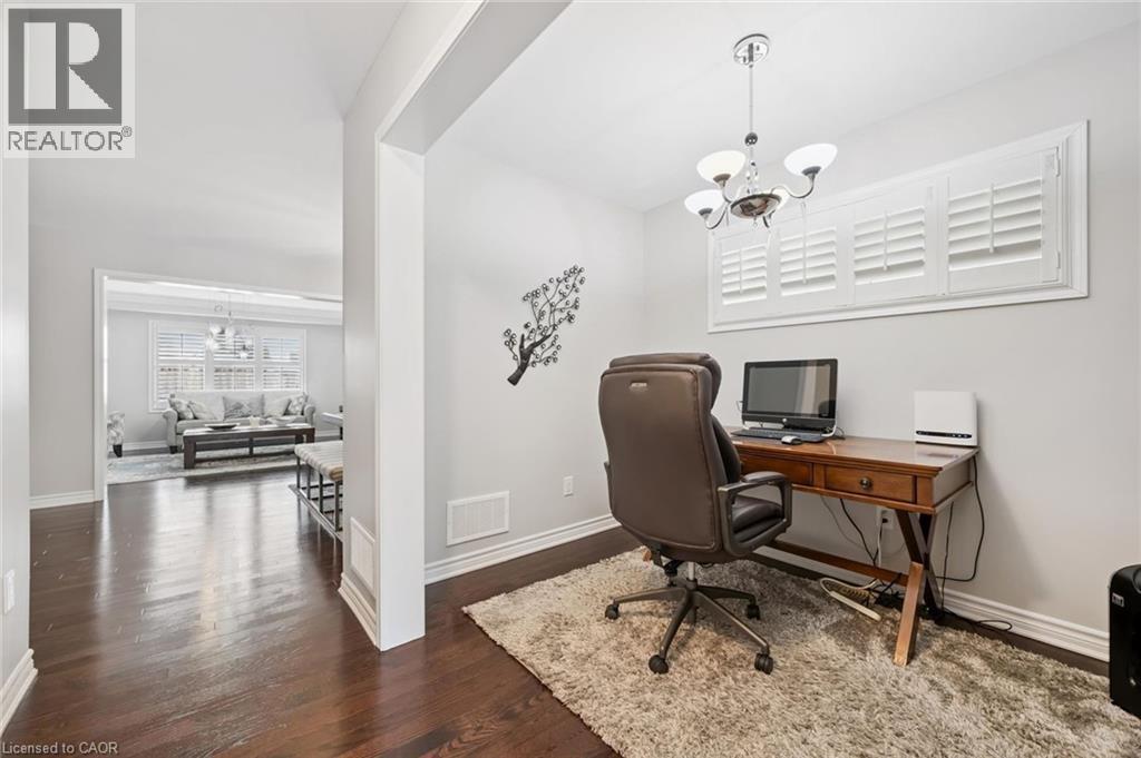 Home office featuring hanging lights and dark wood-type flooring - 38 Park Glen Street, Kitchener, ON - Indoor Photo Showing Office