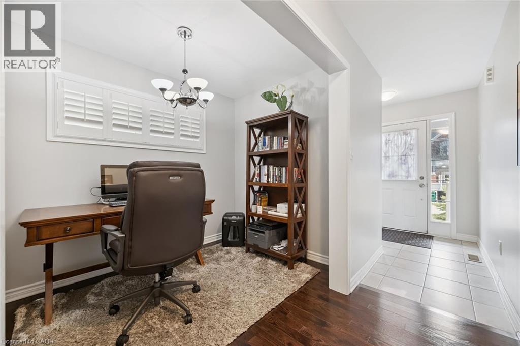 Office space with wood finished floors and a chandelier - 38 Park Glen Street, Kitchener, ON - Indoor Photo Showing Office