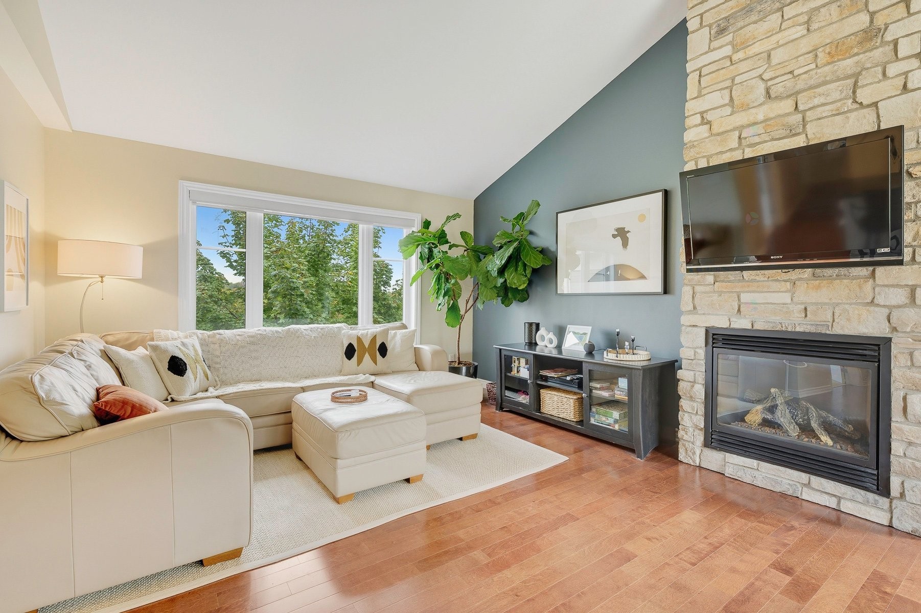 Living Room - 341 Ch. Valanza, Piedmont, QC - Indoor Photo Showing Living Room With Fireplace