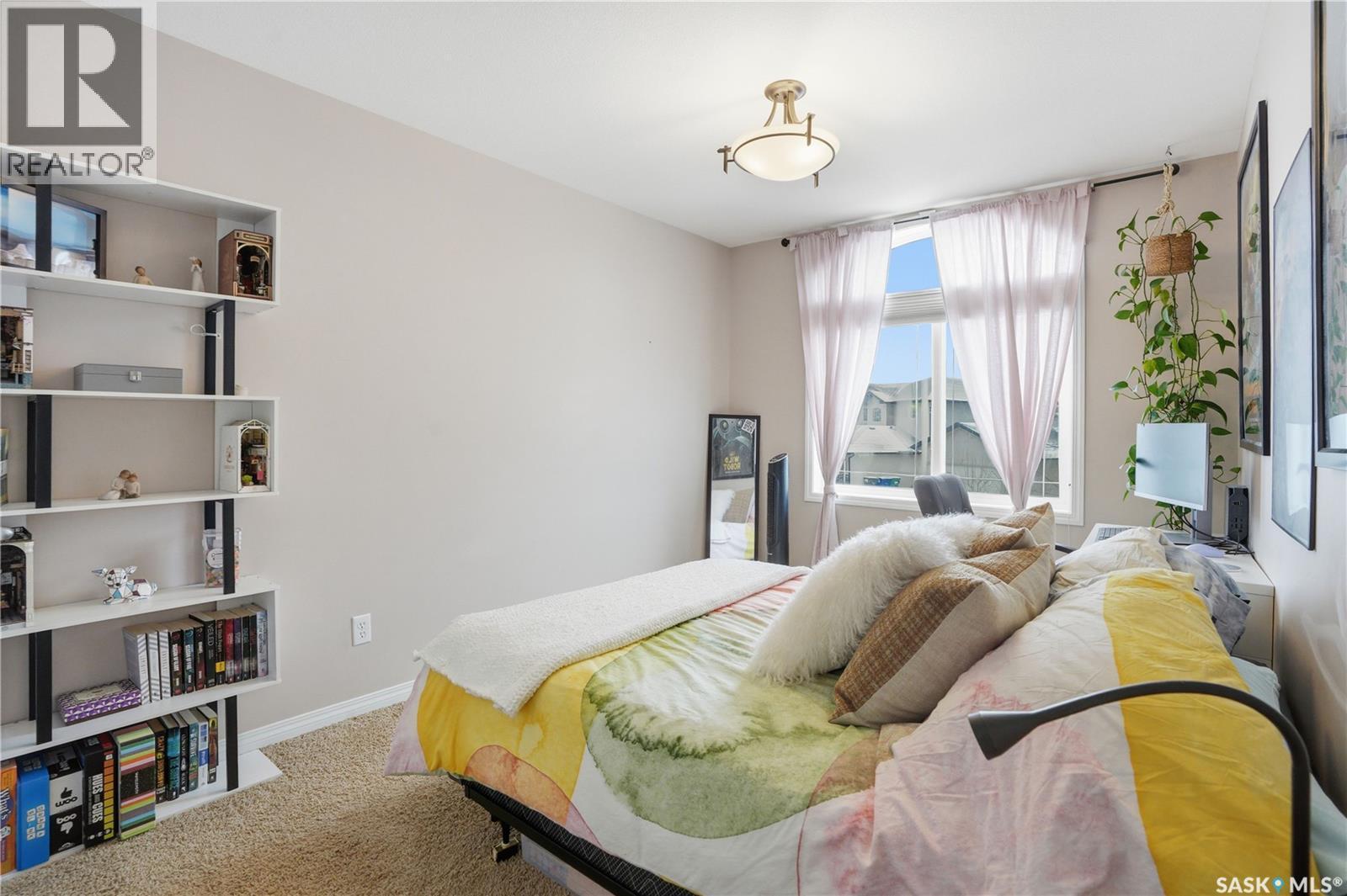 17 622 Lamarsh Road, Saskatoon, SK - Indoor Photo Showing Bedroom