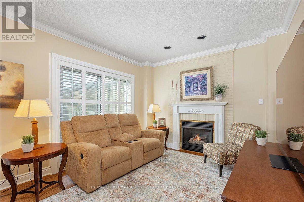 263 Mcclellan Way, Aurora, ON - Indoor Photo Showing Living Room With Fireplace