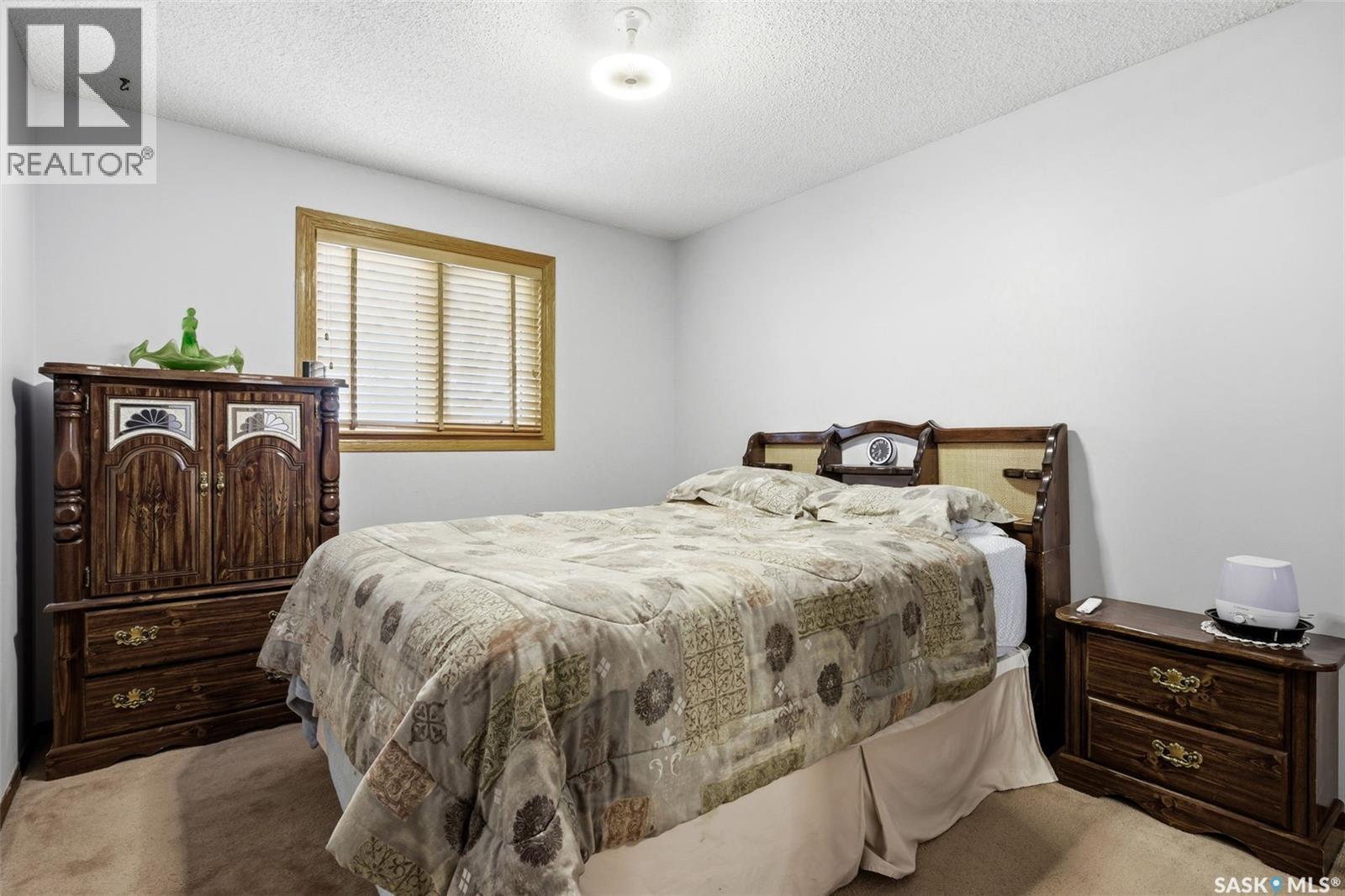 7322 Cribbs Bay, Regina, SK - Indoor Photo Showing Bedroom