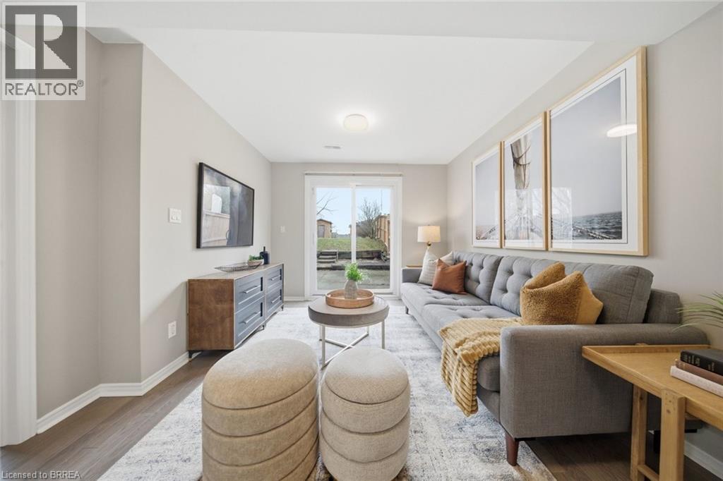Living area with wood finished floors and baseboards - 7 Forest Drive, Paris, ON - Indoor
