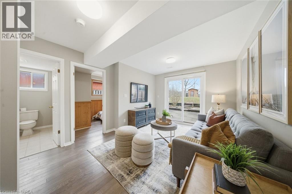 Living room with hardwood / wood-style floors and healthy amount of natural light - 7 Forest Drive, Paris, ON - Indoor Photo Showing Living Room