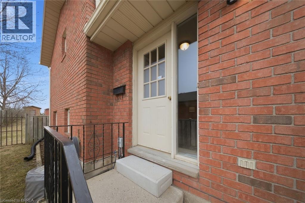 Entrance to property featuring brick siding - 7 Forest Drive, Paris, ON - Outdoor With Deck Patio Veranda With Exterior
