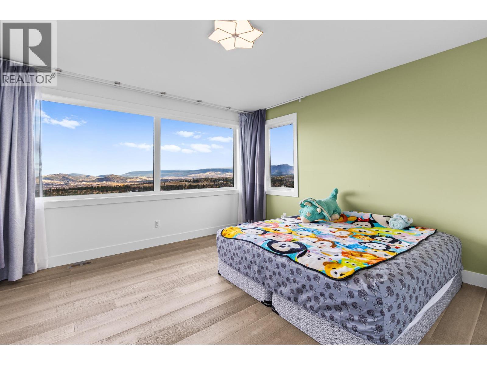 2nd floor bedroom - 1068 Clarance Avenue, Kelowna, BC - Indoor Photo Showing Bedroom