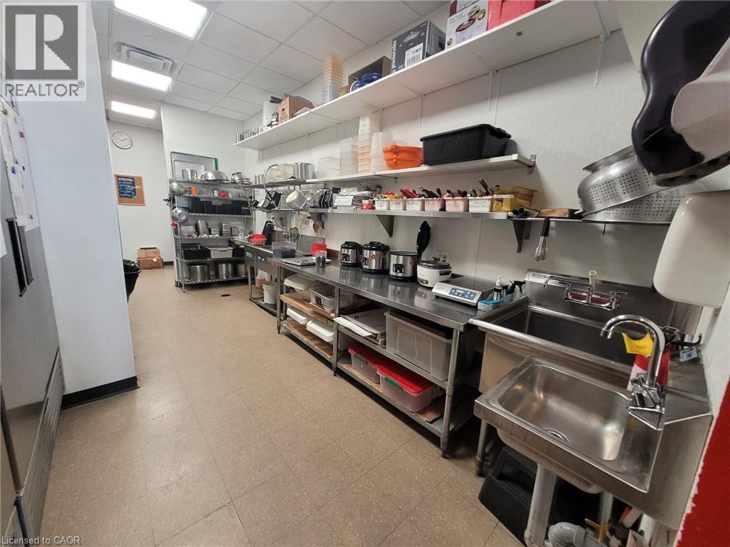 Kitchen featuring a paneled ceiling and a sink - 2000 Appleby Line, Burlington, ON