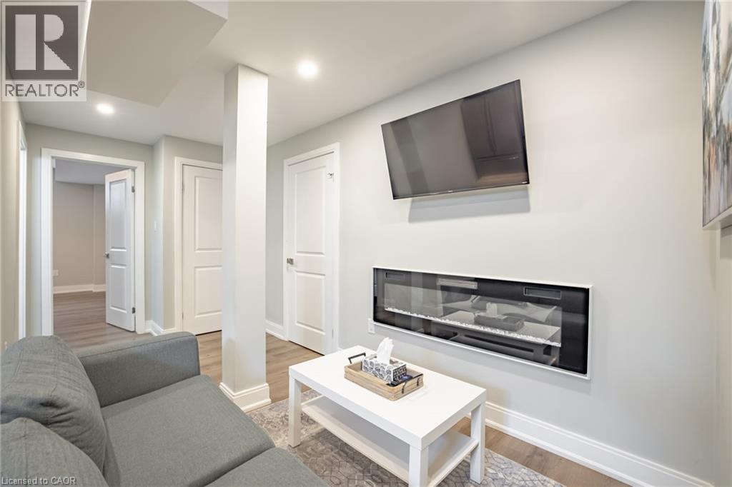 4 Lockman Drive, Ancaster, ON - Indoor Photo Showing Living Room With Fireplace