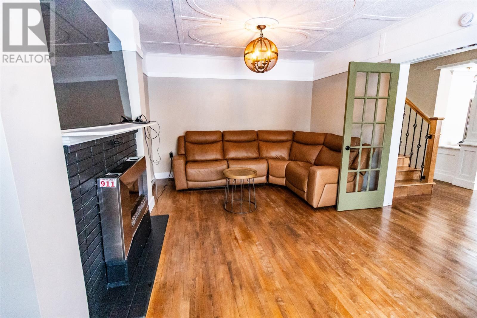 12 Upper Nicholsville Road, Deer Lake, NL - Indoor With Fireplace