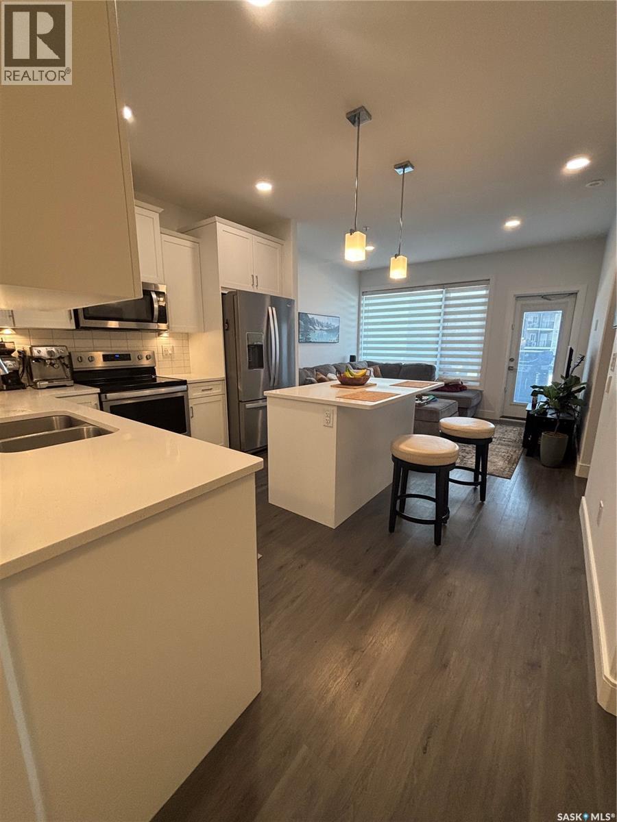 113 105 Willis Crescent, Saskatoon, SK - Indoor Photo Showing Kitchen With Double Sink