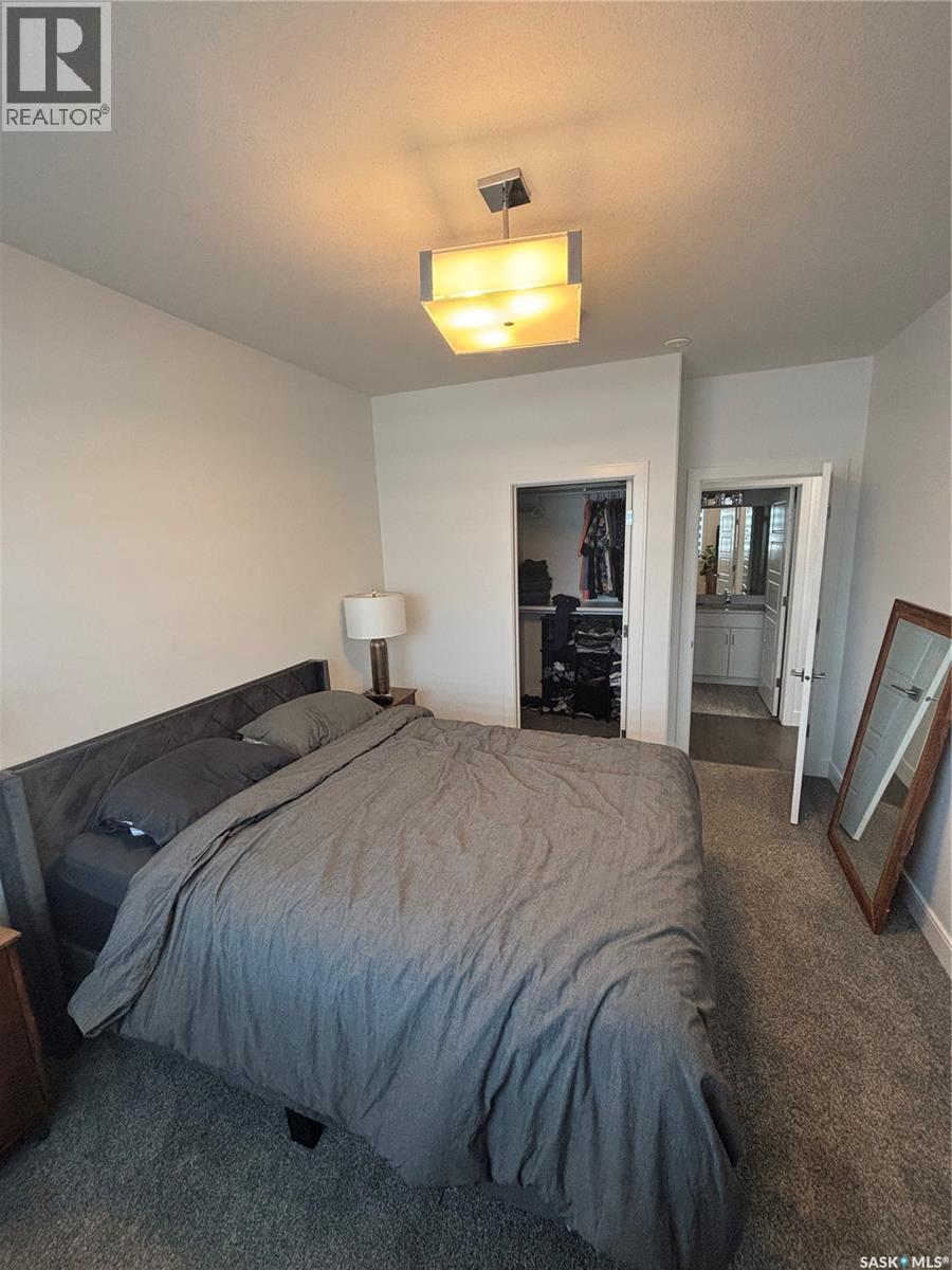 113 105 Willis Crescent, Saskatoon, SK - Indoor Photo Showing Bedroom