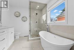 Standalone Tub, Paired With Frameless Glass Shower - 