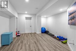 Home Gym Area and Rough-in for Kitchen/Wet Bar - 