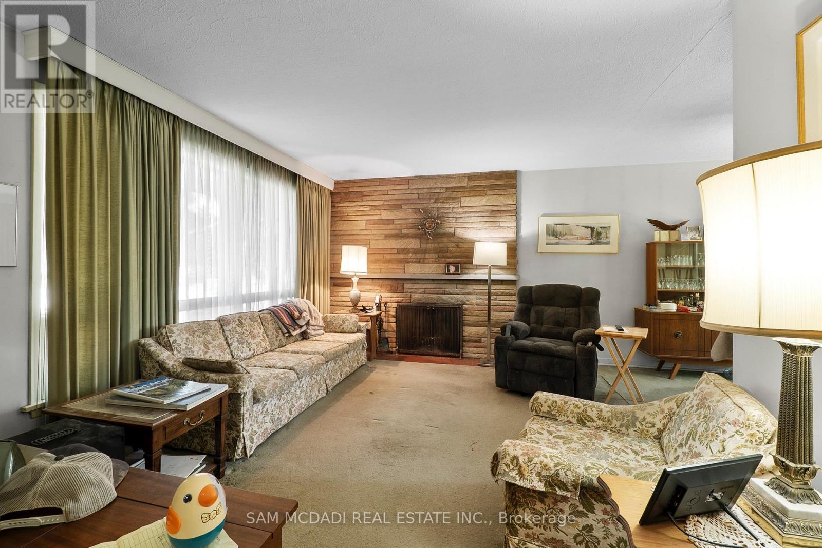 1491 Woodeden Drive, Mississauga, ON - Indoor Photo Showing Living Room With Fireplace