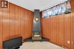 Workout room with light carpet -