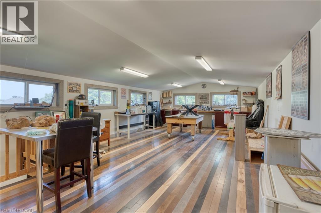 Dining room with lofted ceiling and hardwood / wood-style floors - 15 Marquette Drive, Kitchener, ON - Indoor Photo Showing Dining Room
