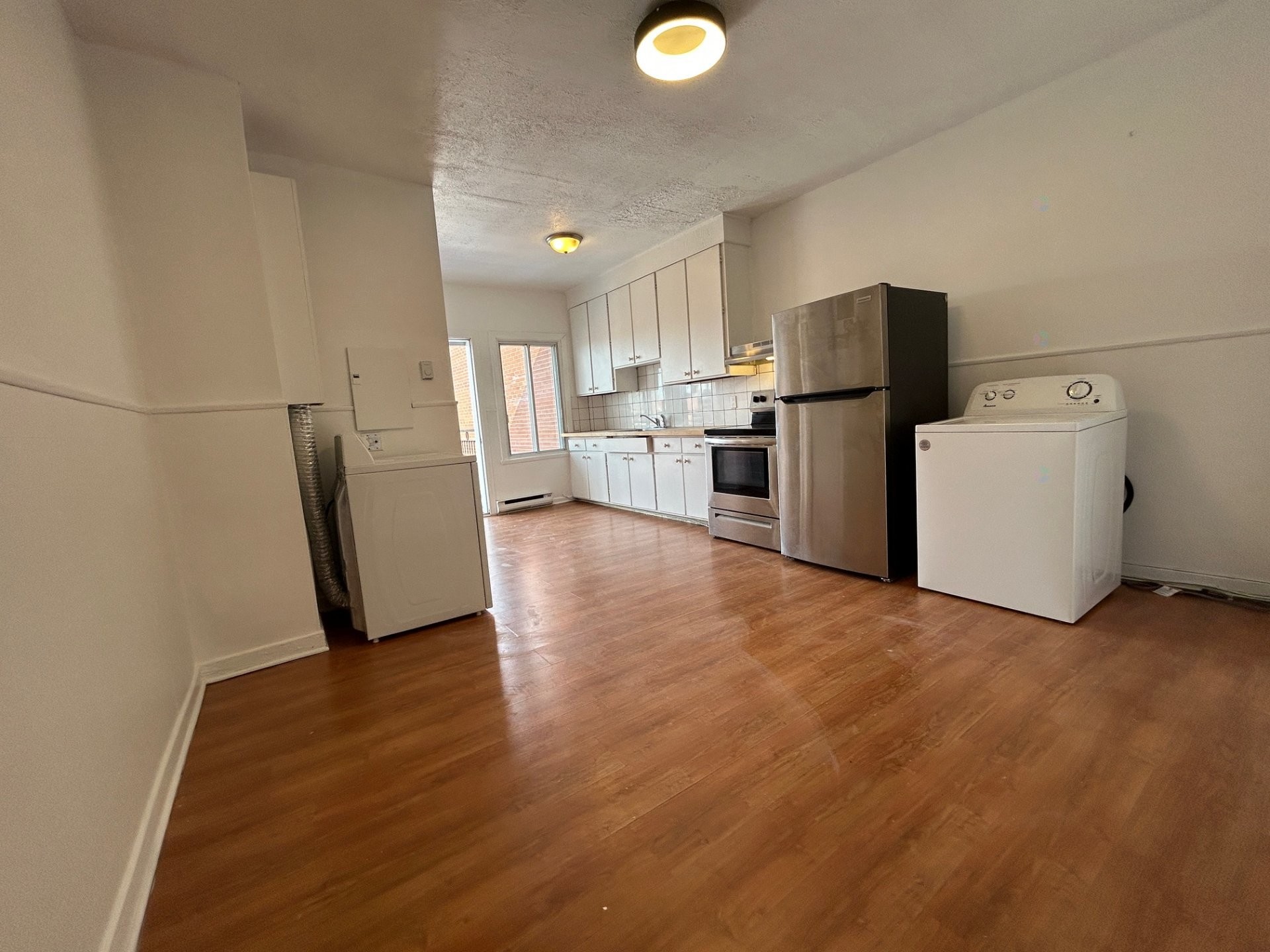 Salle à manger - 5895 Rue De Normanville, Montréal (Rosemont/La Petite-Patrie), QC - Indoor Photo Showing Laundry Room