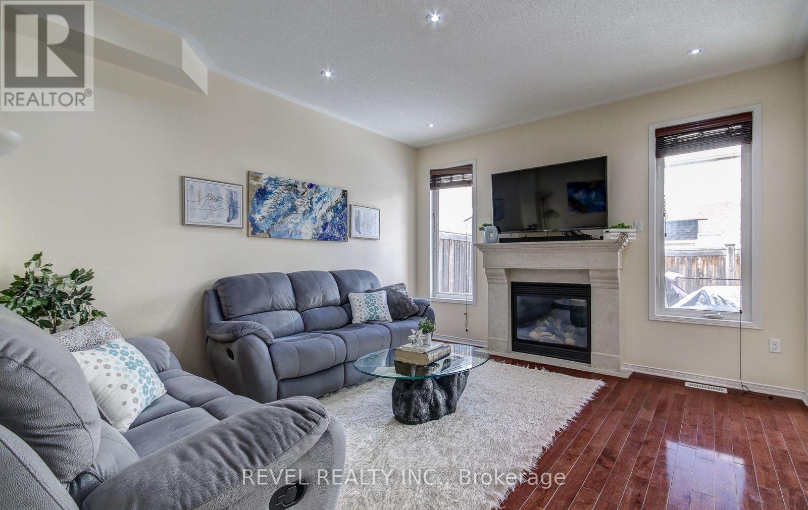 5 Treegrove Crescent, Brampton, ON - Indoor Photo Showing Living Room With Fireplace