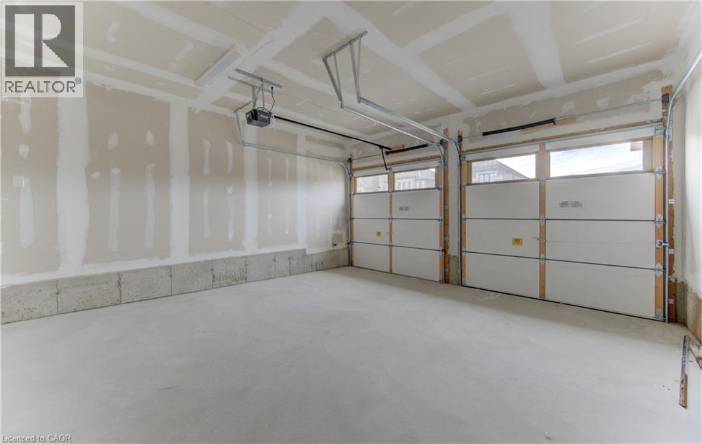 39 Guernsey Drive, Kitchener, ON - Indoor Photo Showing Garage