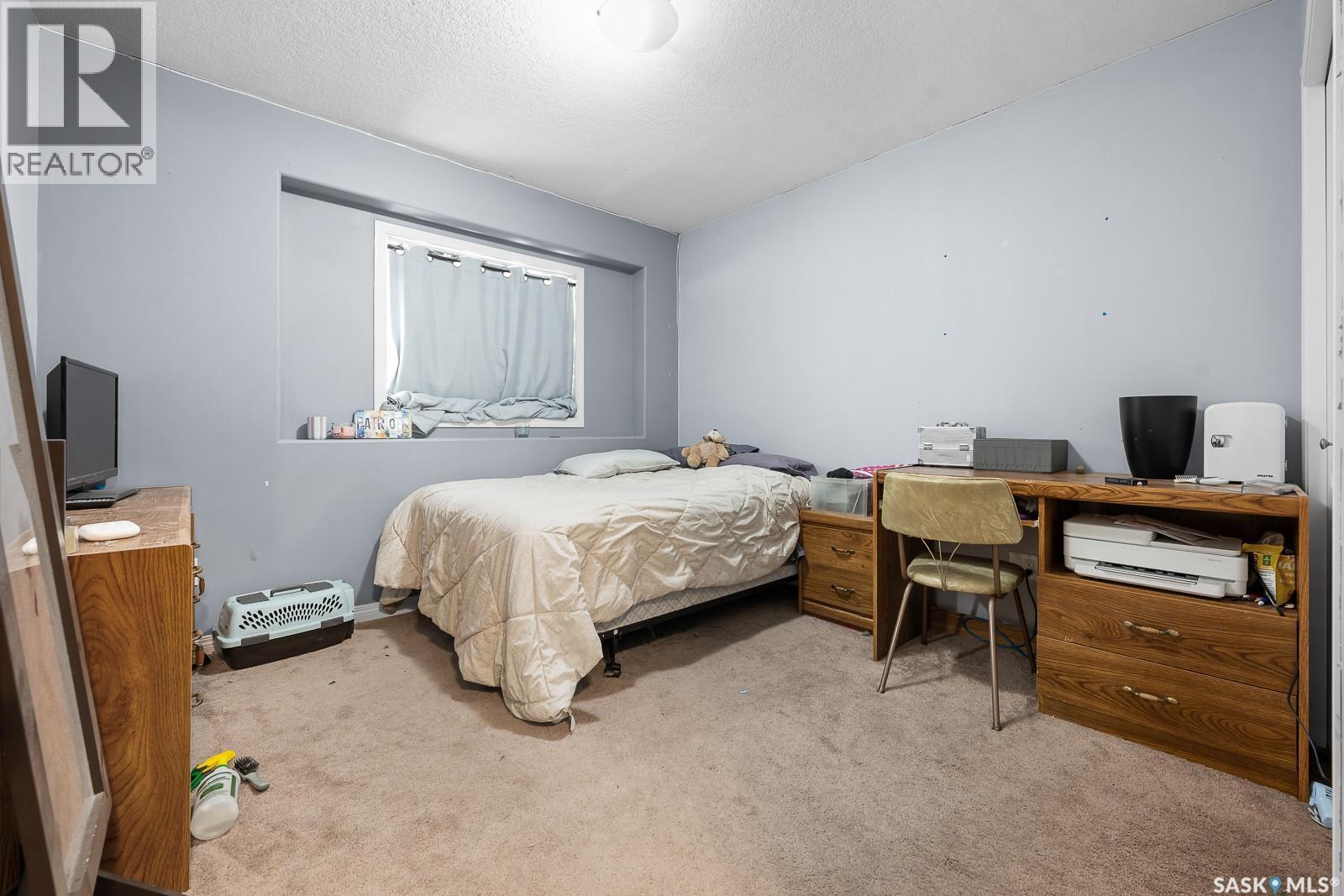 411 3826 Dewdney Avenue E, Regina, SK - Indoor Photo Showing Bedroom