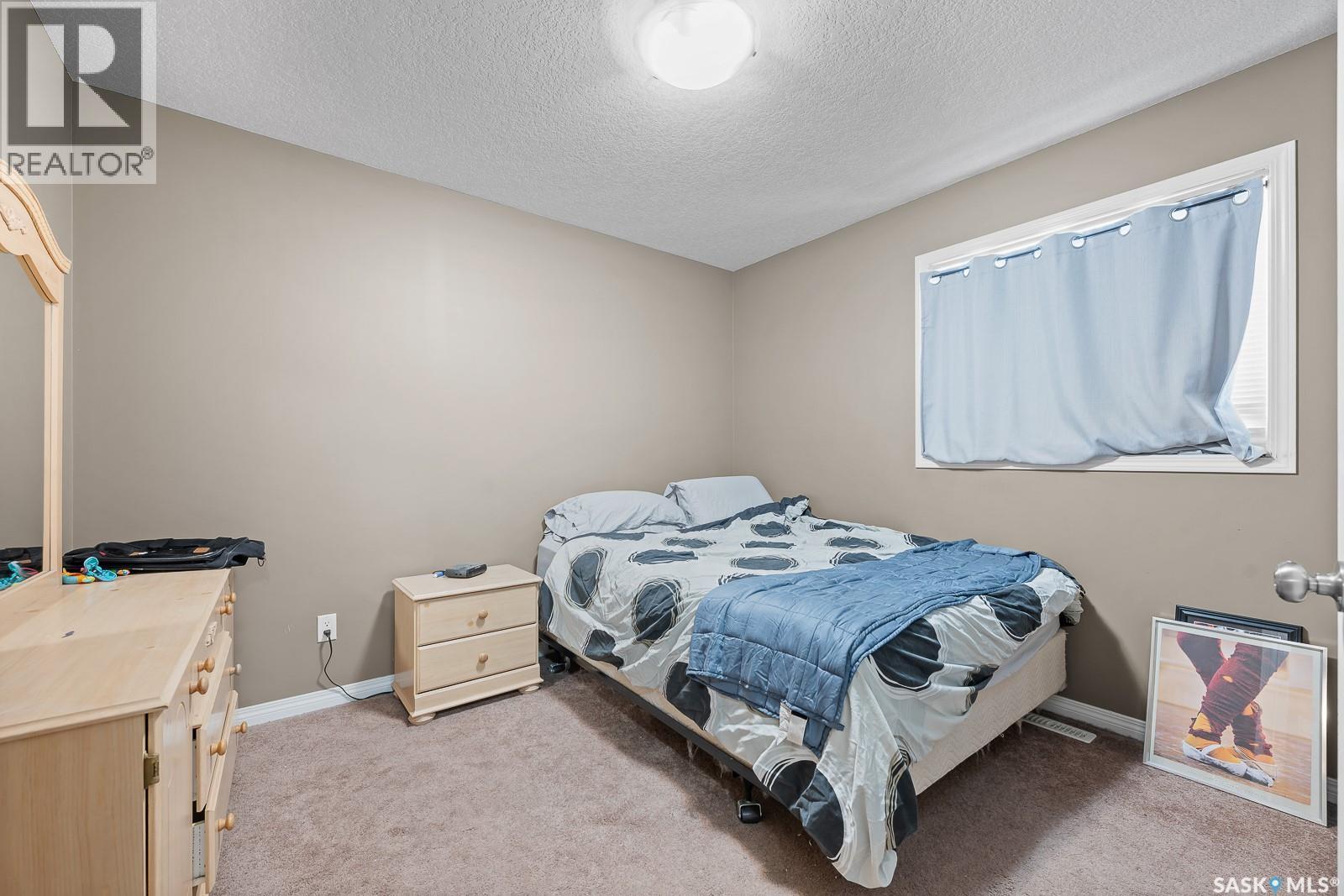 411 3826 Dewdney Avenue E, Regina, SK - Indoor Photo Showing Bedroom