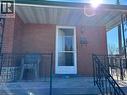 Property entrance with brick siding - 1224 Dunsmure Road, Hamilton, ON  - Outdoor With Exterior 