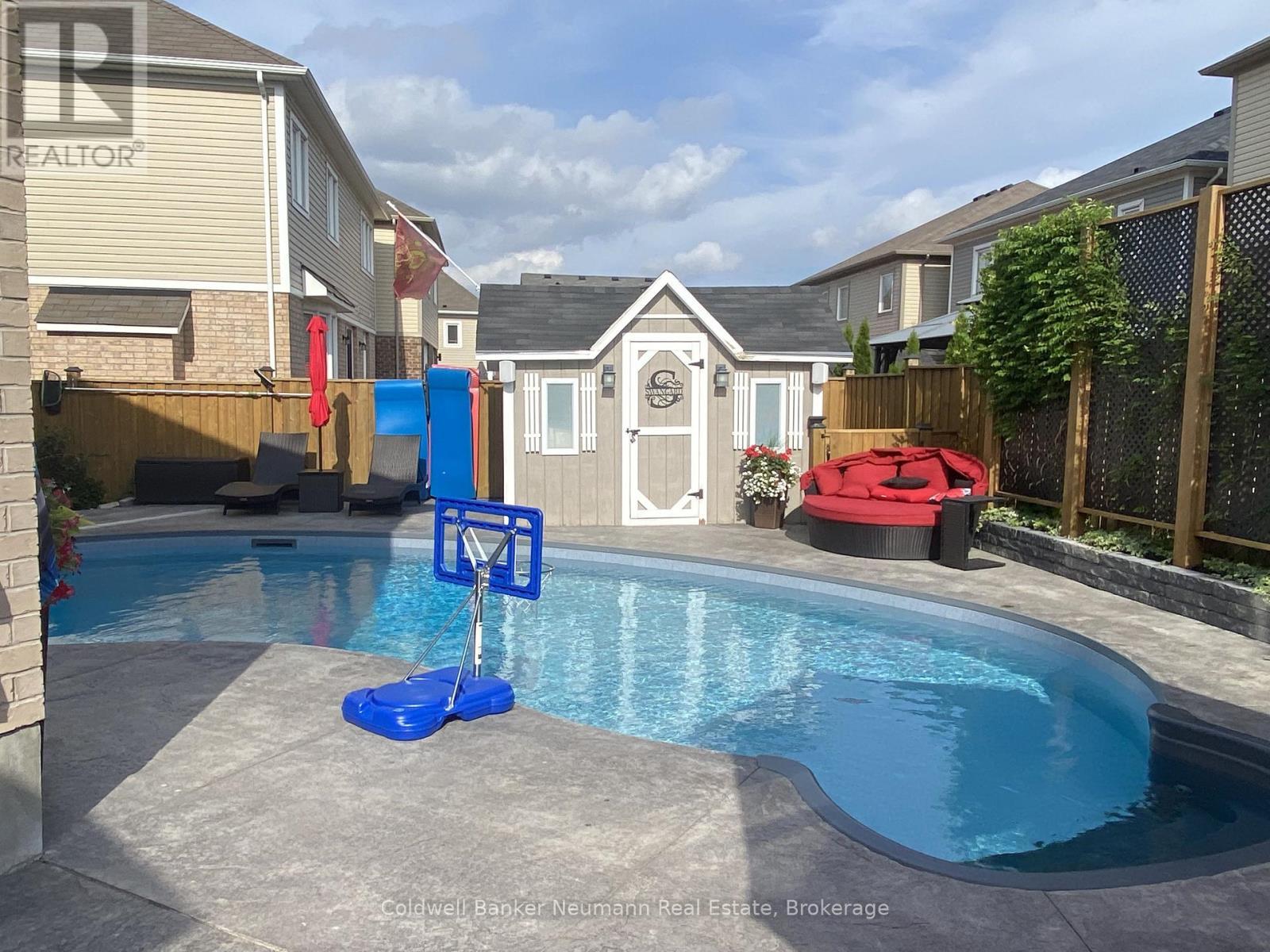 old shed, summer photo - 356 Falling Green Crescent, Kitchener, ON - Outdoor With In Ground Pool