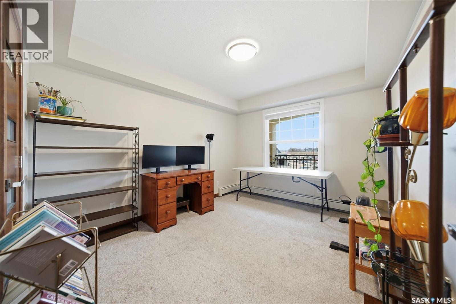 211 130 Phelps Way, Saskatoon, SK - Indoor Photo Showing Gym Room