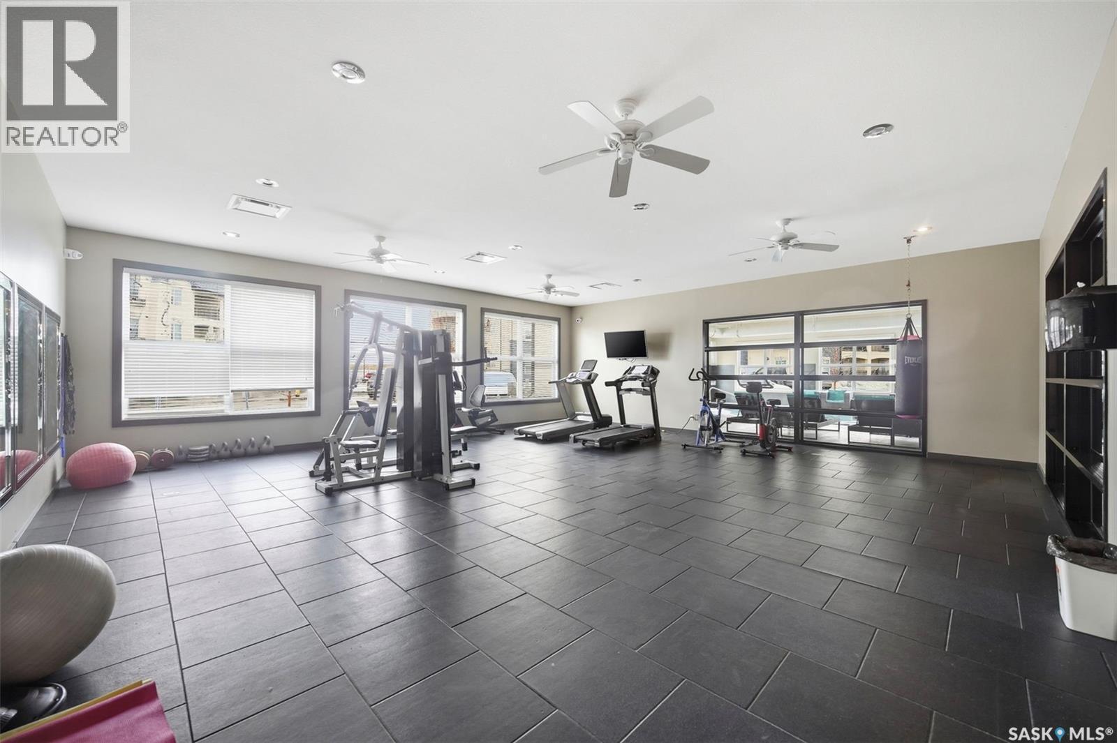 211 130 Phelps Way, Saskatoon, SK - Indoor Photo Showing Gym Room