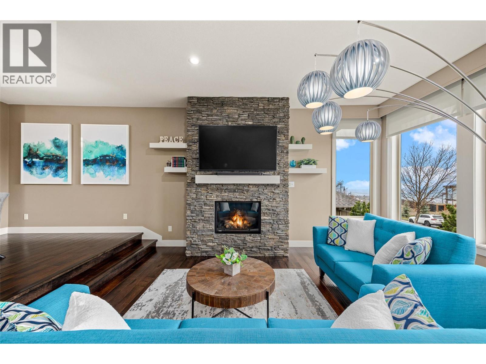 1768 Split Rail Place, Kelowna, BC - Indoor Photo Showing Living Room With Fireplace