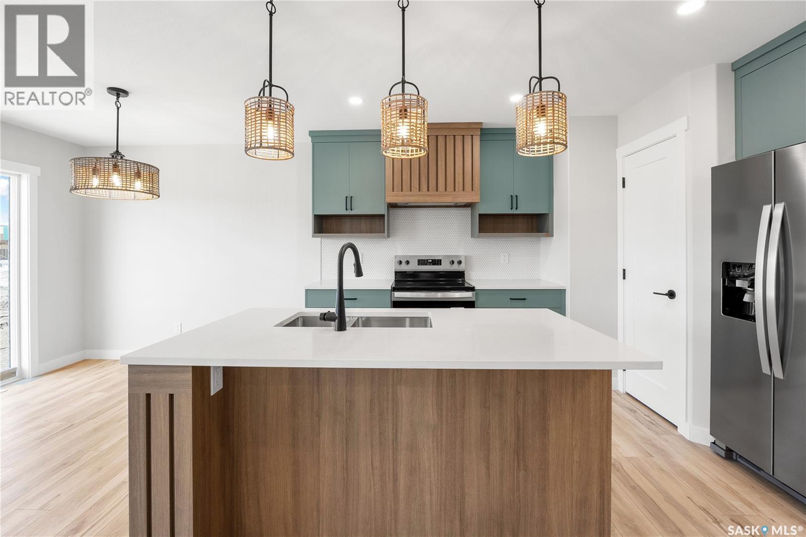 213 Yuel Lane, Saskatoon, SK - Indoor Photo Showing Kitchen With Upgraded Kitchen