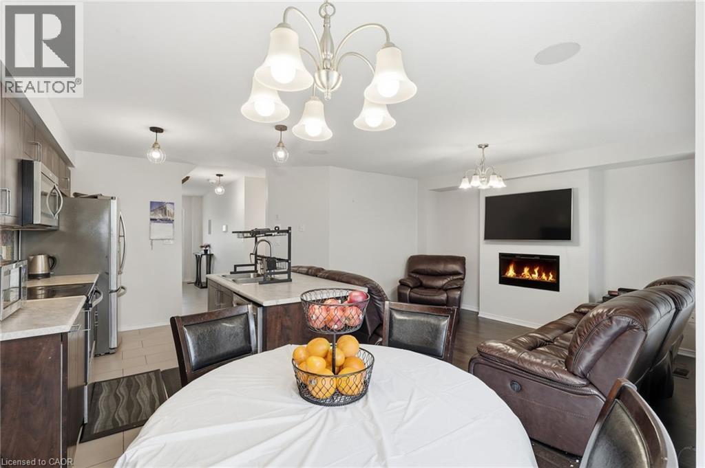 45 Kelso Drive, Caledonia, ON - Indoor Photo Showing Dining Room With Fireplace