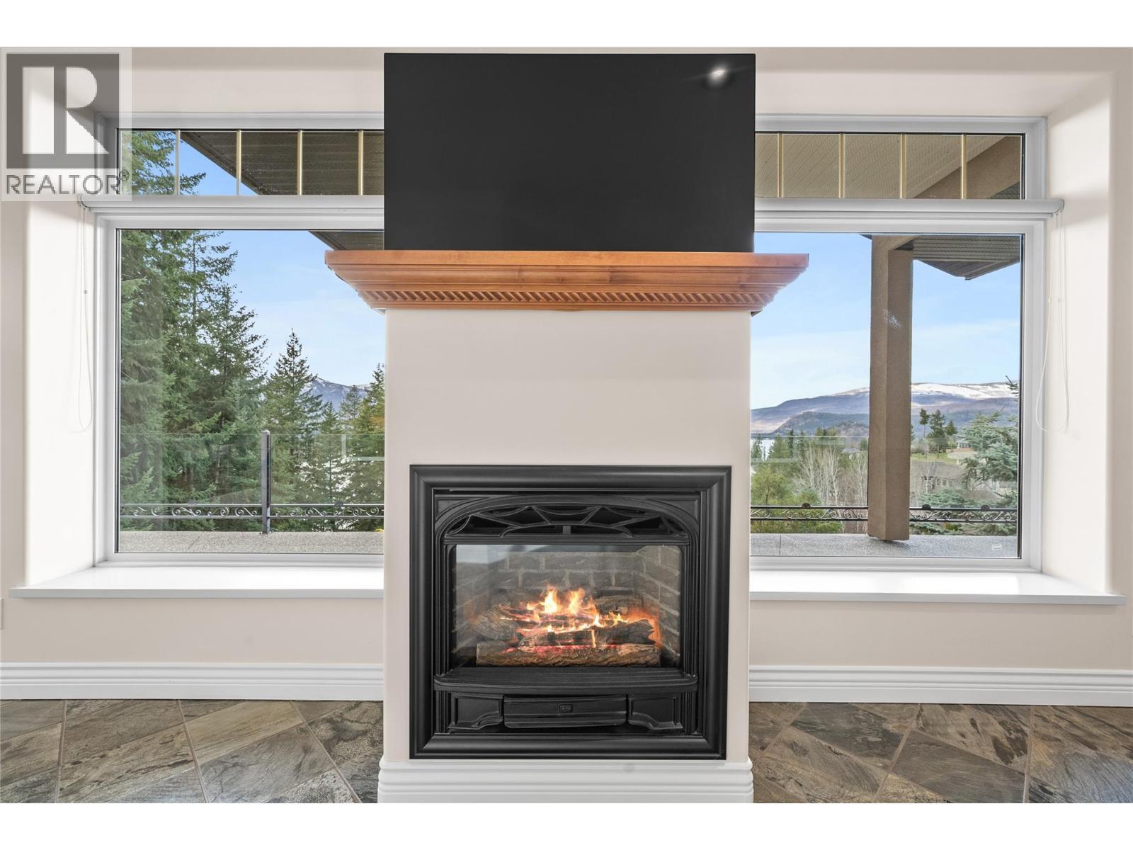 3676 Mcbride Road, Blind Bay, BC - Indoor Photo Showing Living Room With Fireplace