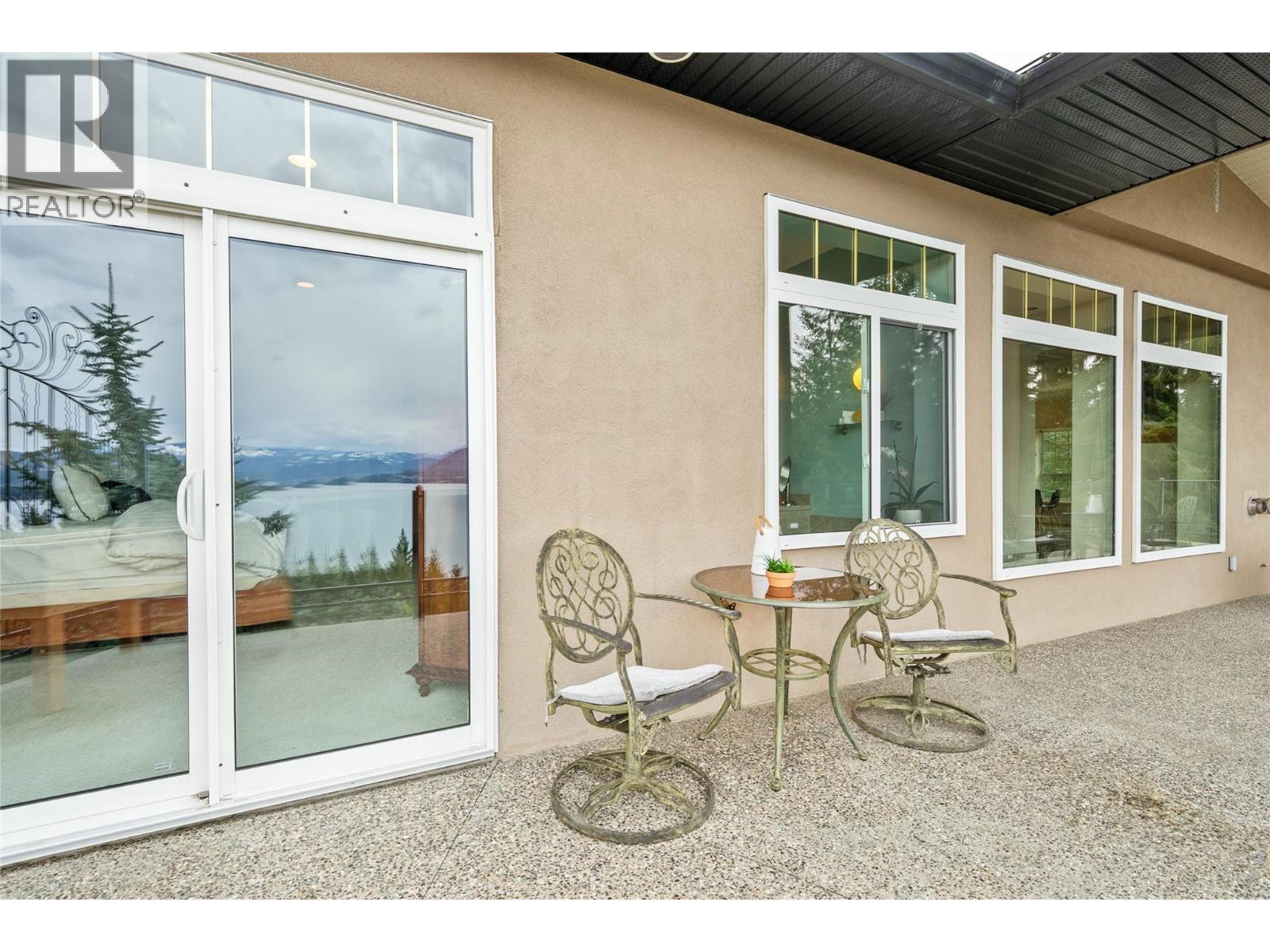 3676 Mcbride Road, Blind Bay, BC - Outdoor With Body Of Water With Exterior