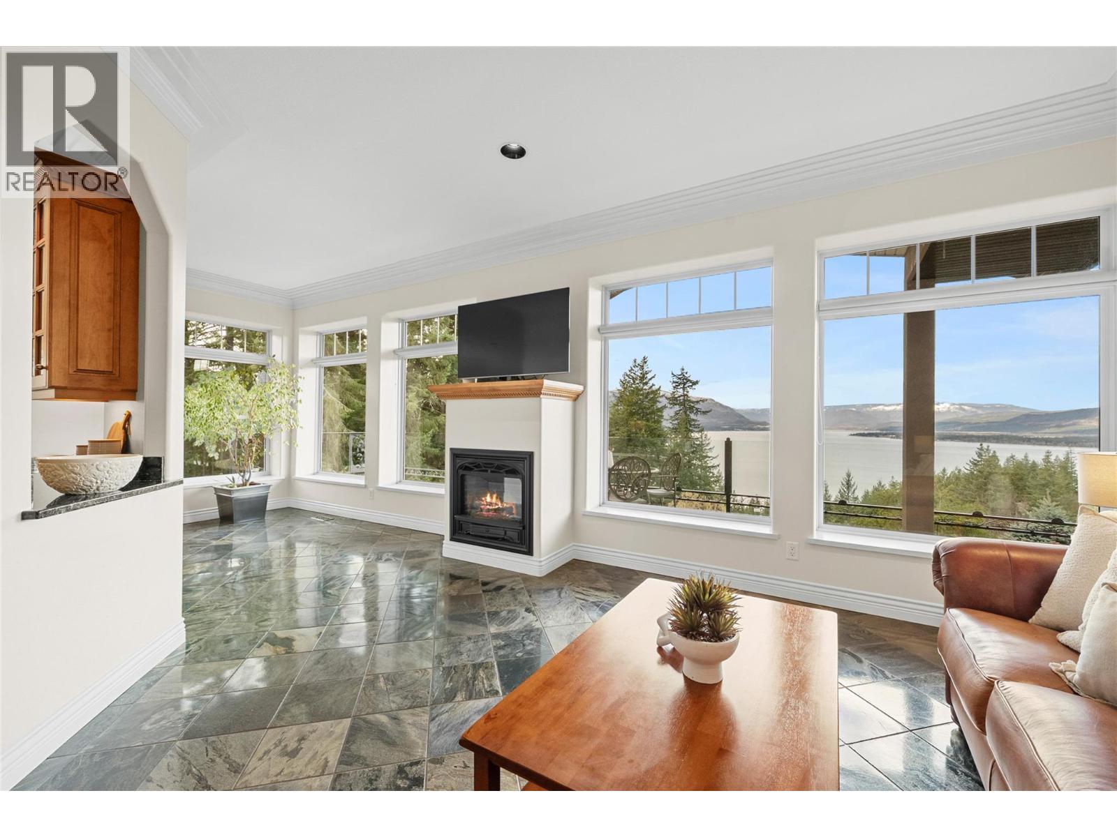 3676 Mcbride Road, Blind Bay, BC - Indoor Photo Showing Living Room With Fireplace