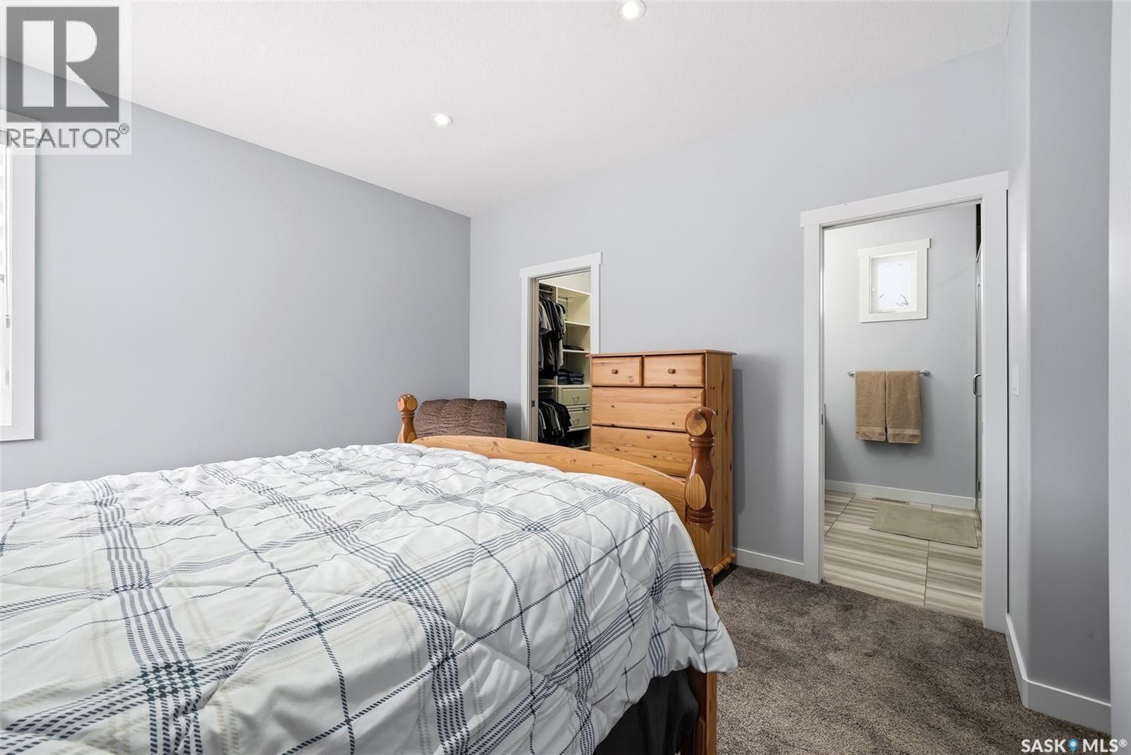3921 Red Lily Bay, Regina, SK - Indoor Photo Showing Bedroom