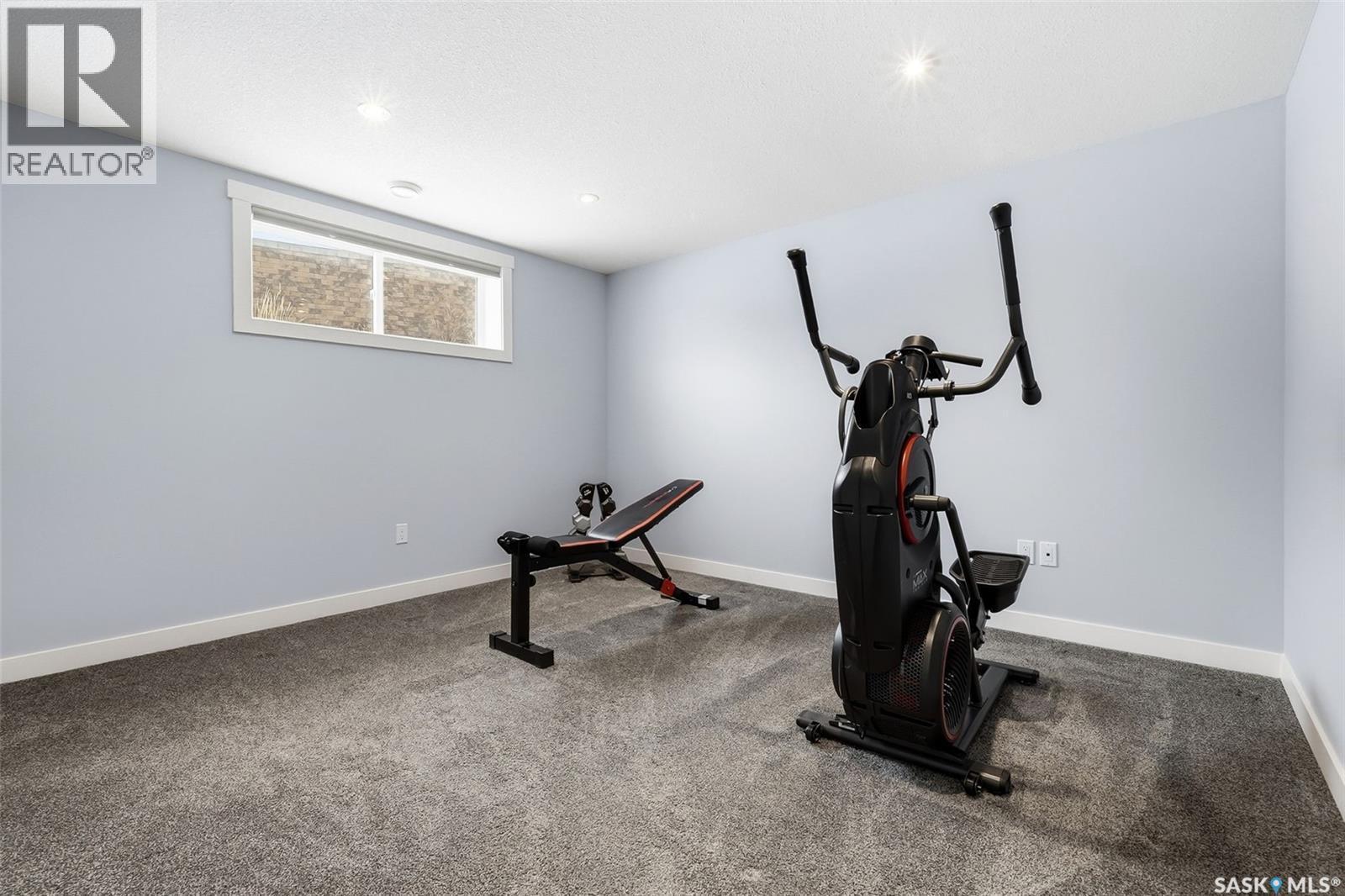 3921 Red Lily Bay, Regina, SK - Indoor Photo Showing Gym Room