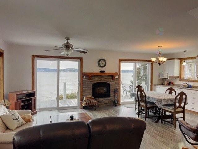 Living Room - 4 Ch. Glenn, Escuminac, QC - Indoor Photo Showing Other Room With Fireplace