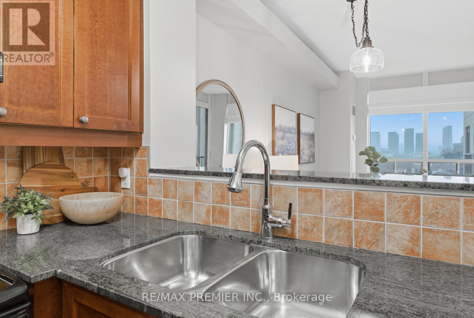 Ph20 - 16 Dallimore Circle, Toronto, ON - Indoor Photo Showing Kitchen With Double Sink
