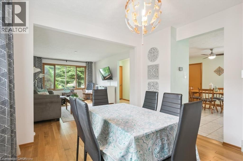Dining room featuring light wood-style flooring and ceiling fan - 47 Claycroft Crescent Unit# Upper, Kitchener, ON - Indoor Photo Showing Dining Room