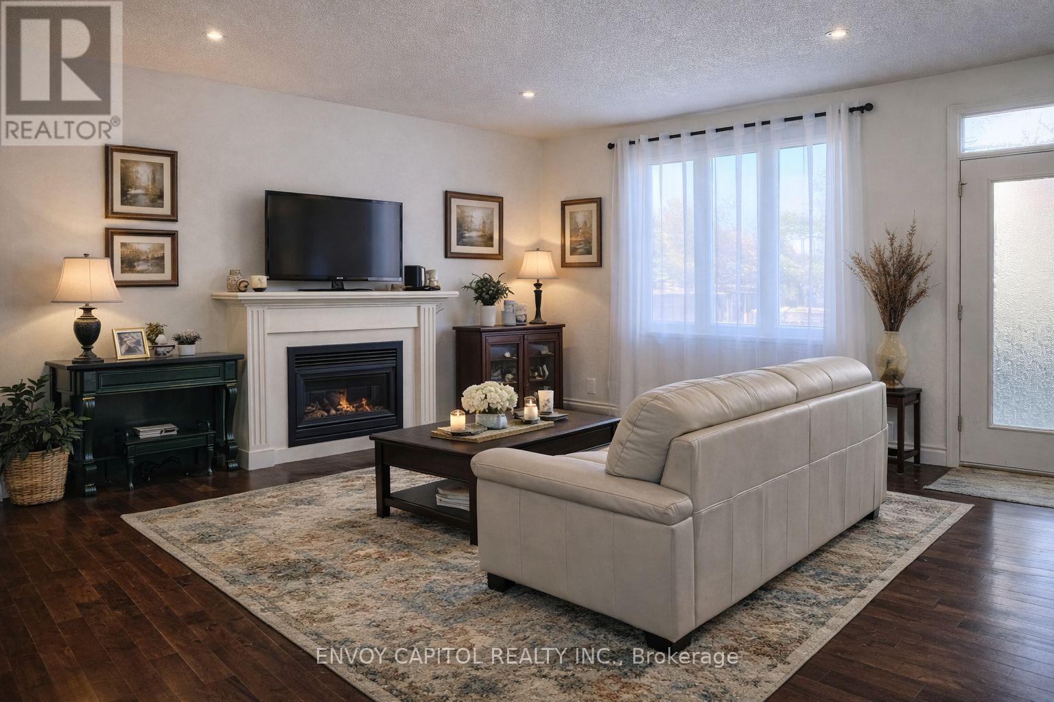 402 Palamino Place, Waterloo, ON - Indoor Photo Showing Living Room With Fireplace