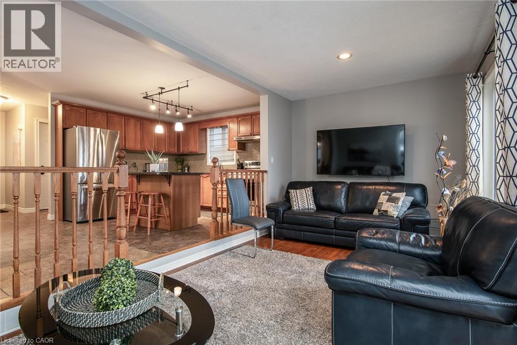 Living area with light wood-type flooring - 236 Dartmoor Crescent, Waterloo, ON - Indoor Photo Showing Living Room
