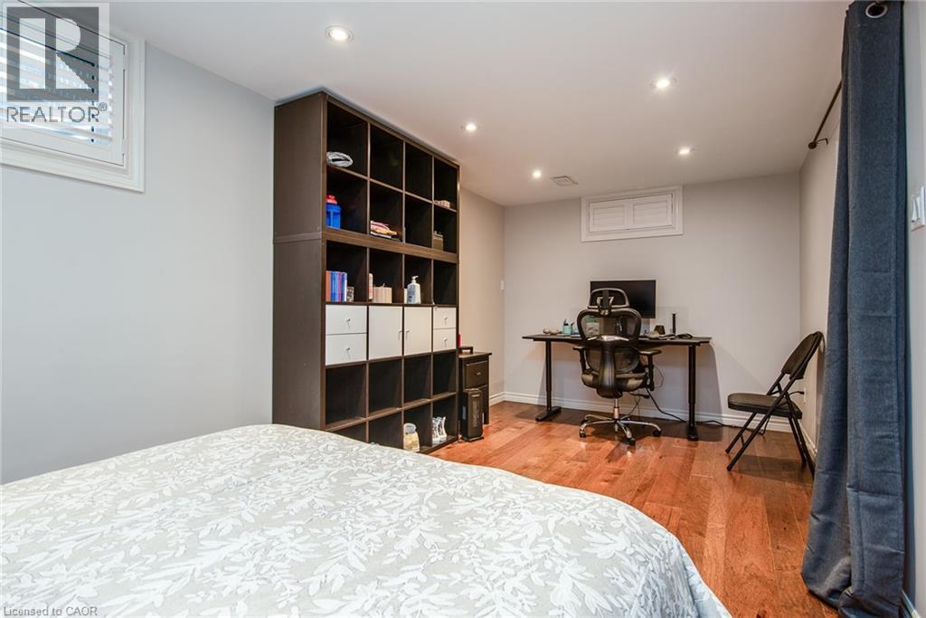 Bedroom featuring light wood-type flooring, recessed lighting, and a desk - 236 Dartmoor Crescent, Waterloo, ON - Indoor Photo Showing Bedroom