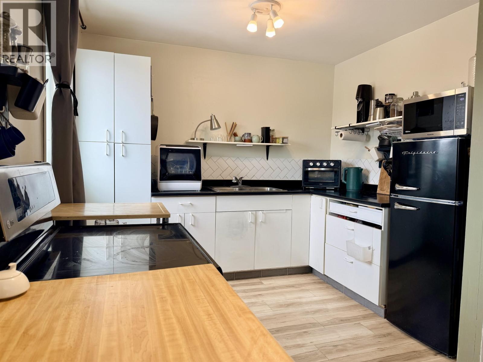 168 E 3Rd Avenue, Fort St. James, BC - Indoor Photo Showing Kitchen With Double Sink