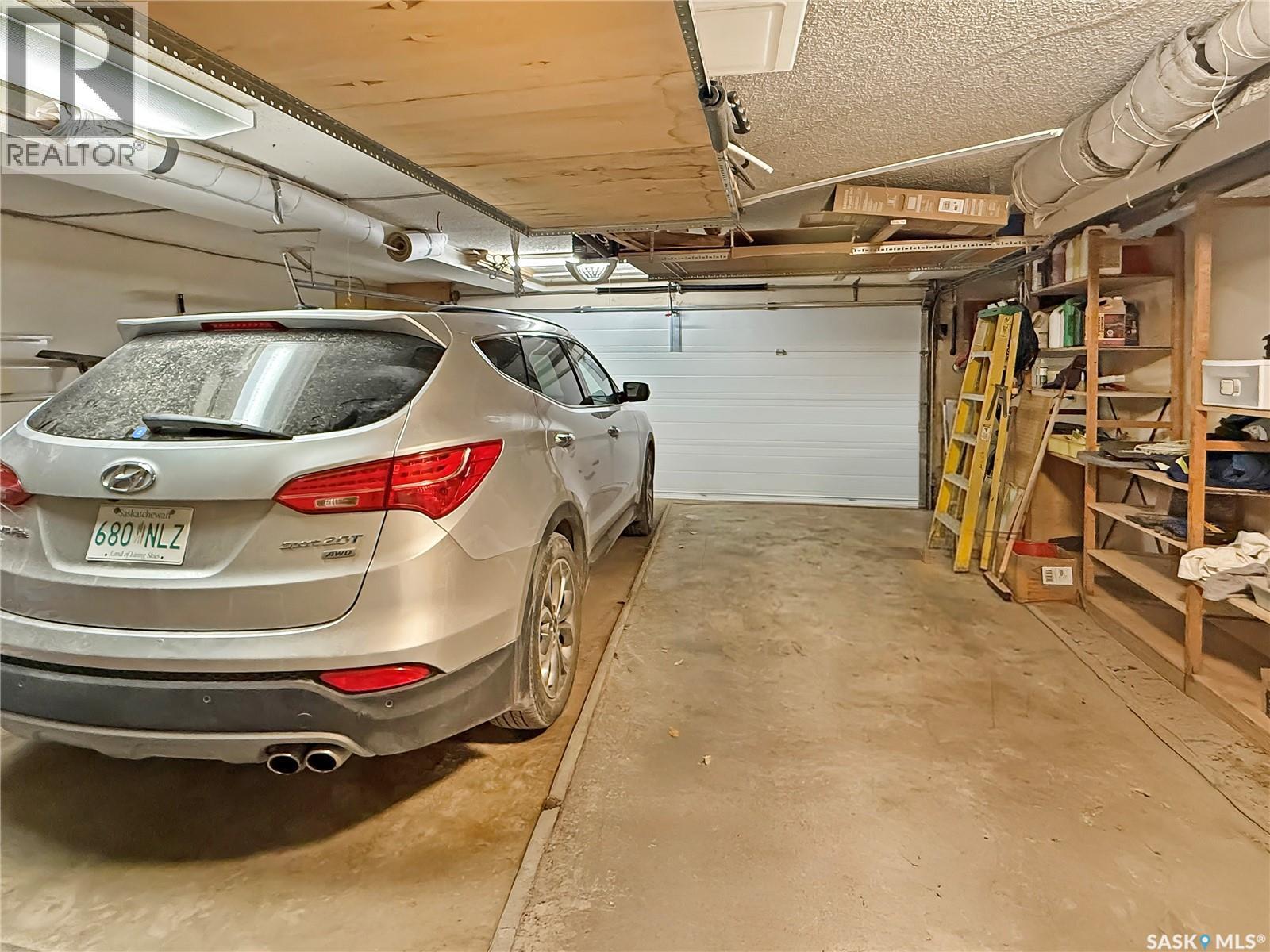 8 275 Alpine Crescent, Swift Current, SK - Indoor Photo Showing Garage